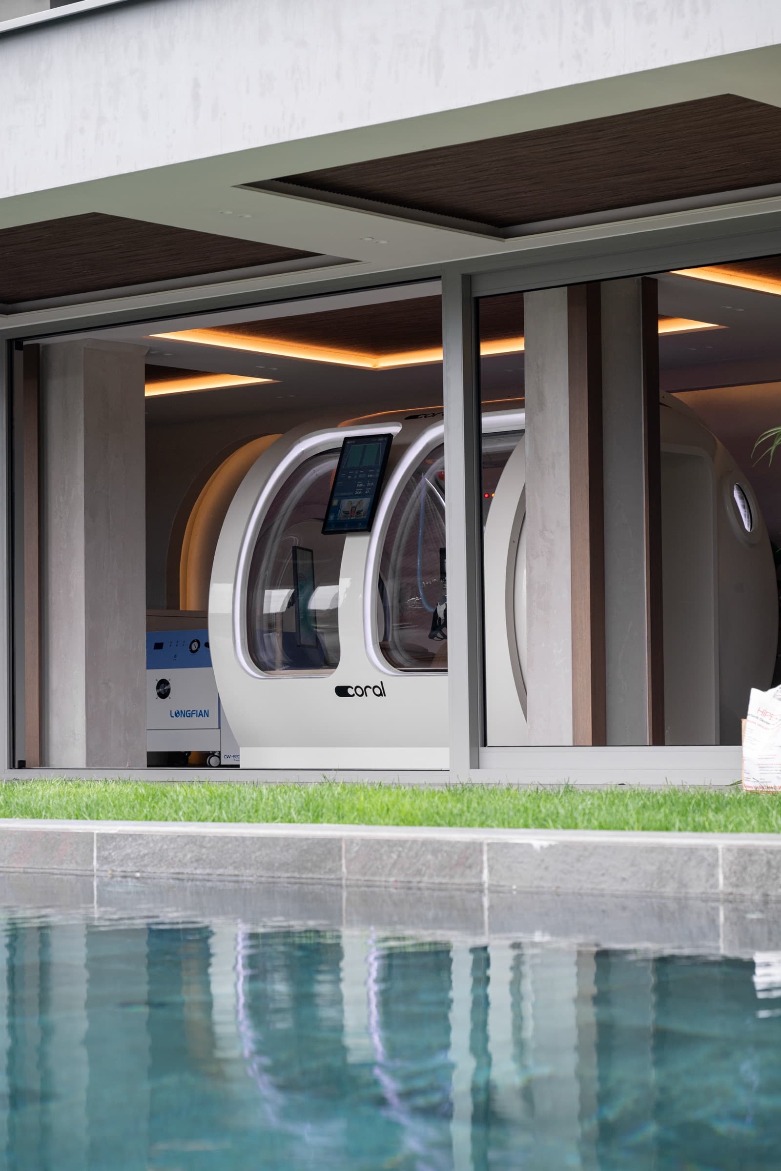 Coral Ark installed by a swimming pool at dusk