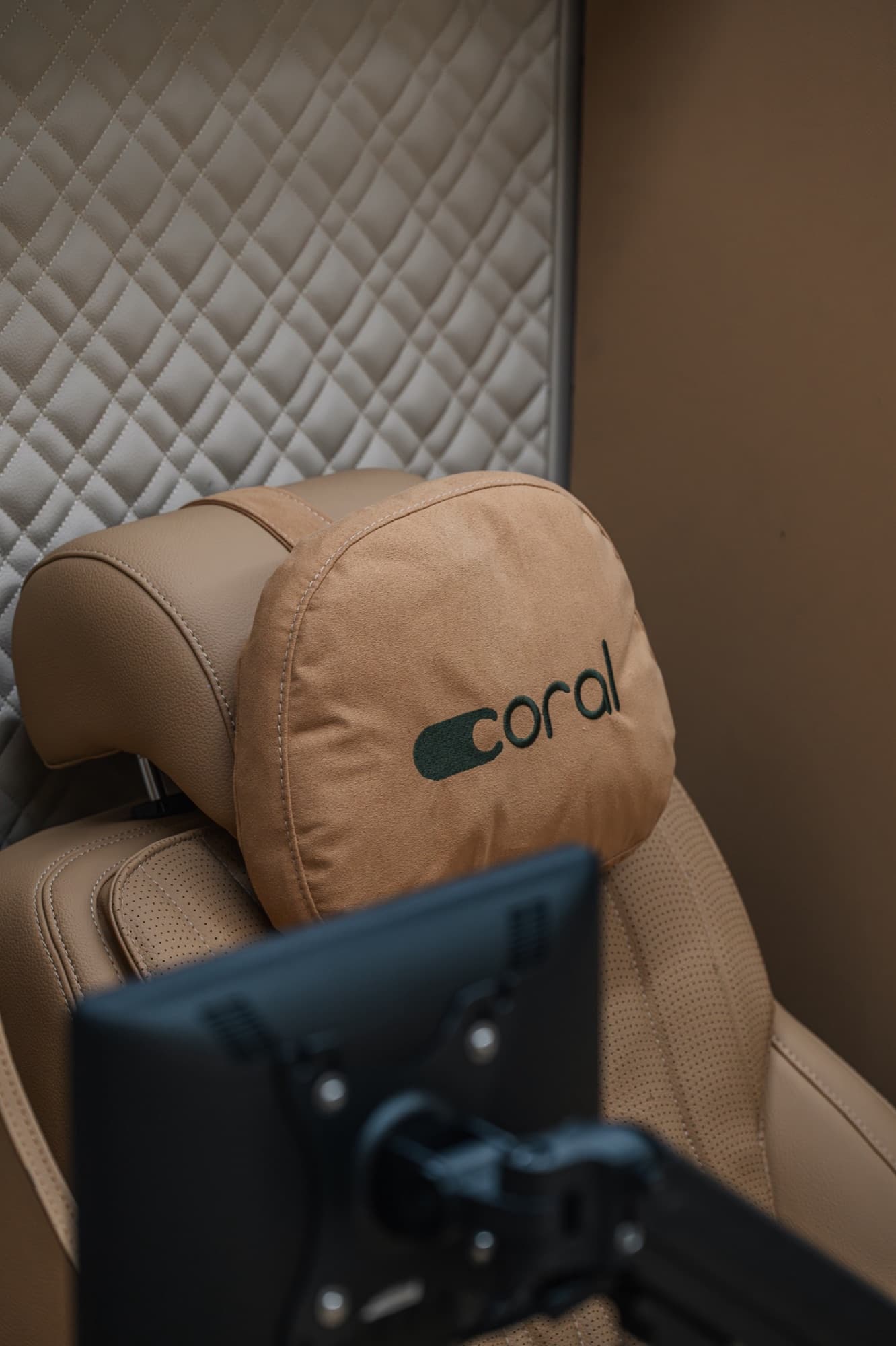 Coral Cube headrest detail with branded cushion, Rwanda installation